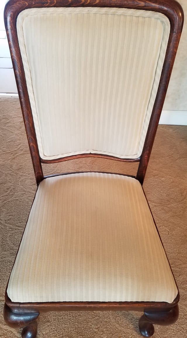 Stained dining chair seat after