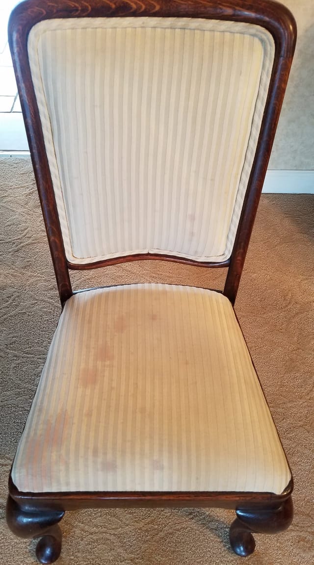 Stained dining chair seat before