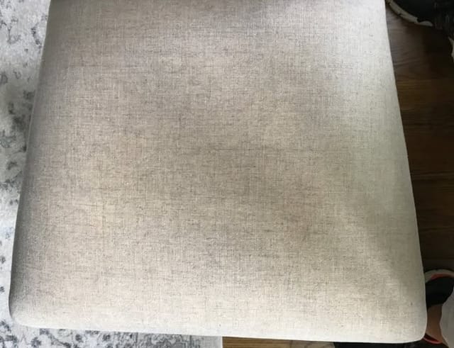 Marker scribbles on a chair seat after