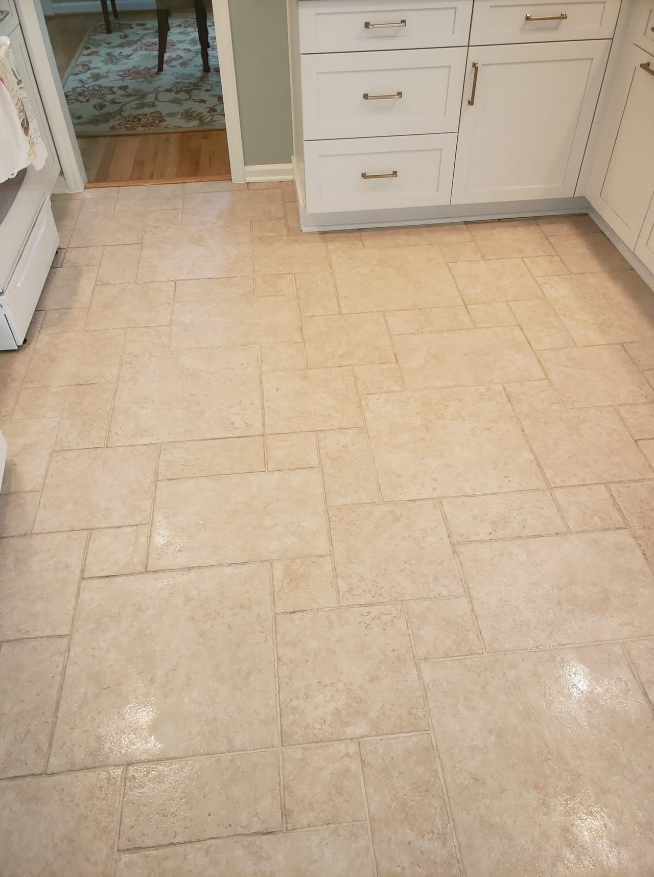Stone tile kitchen floor after