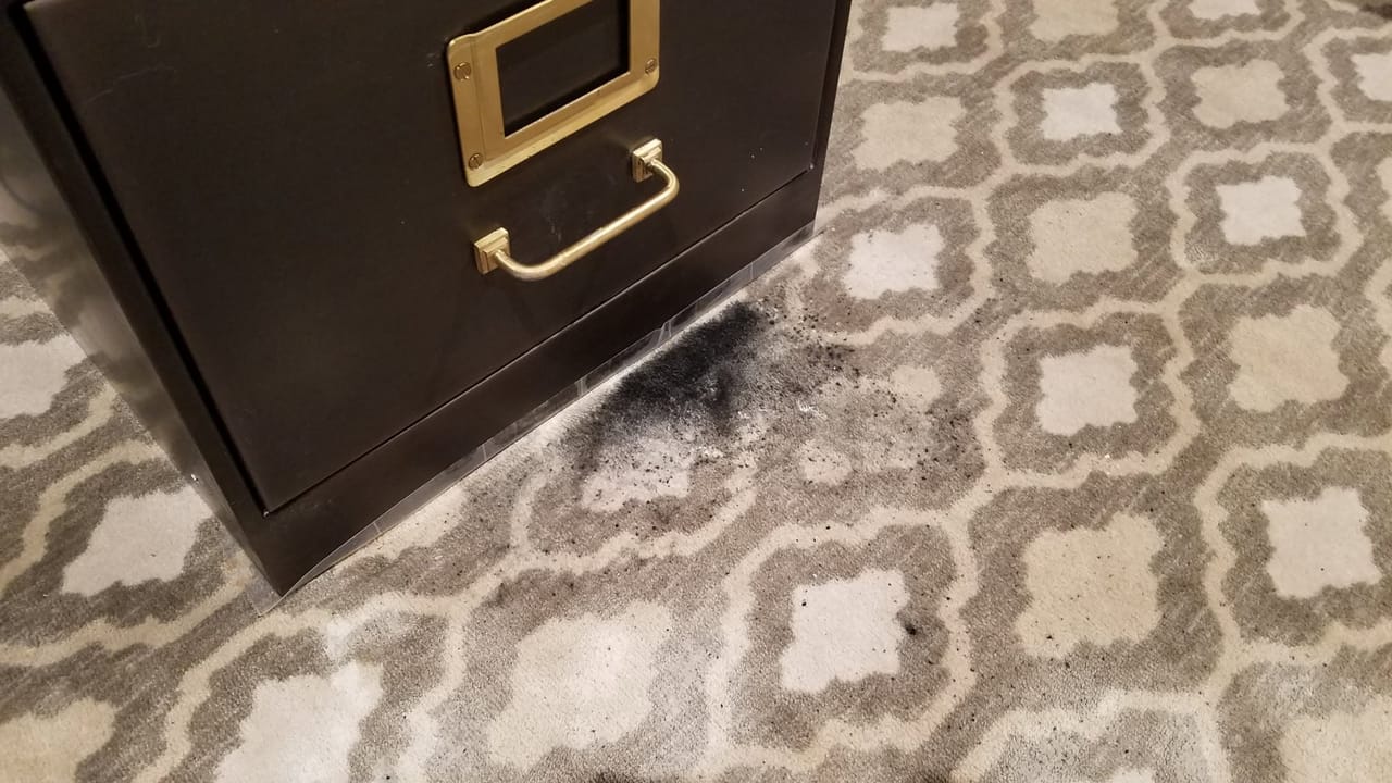 Toner by a file cabinet before