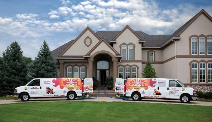 Two Langenwalter vans at a customer's home
