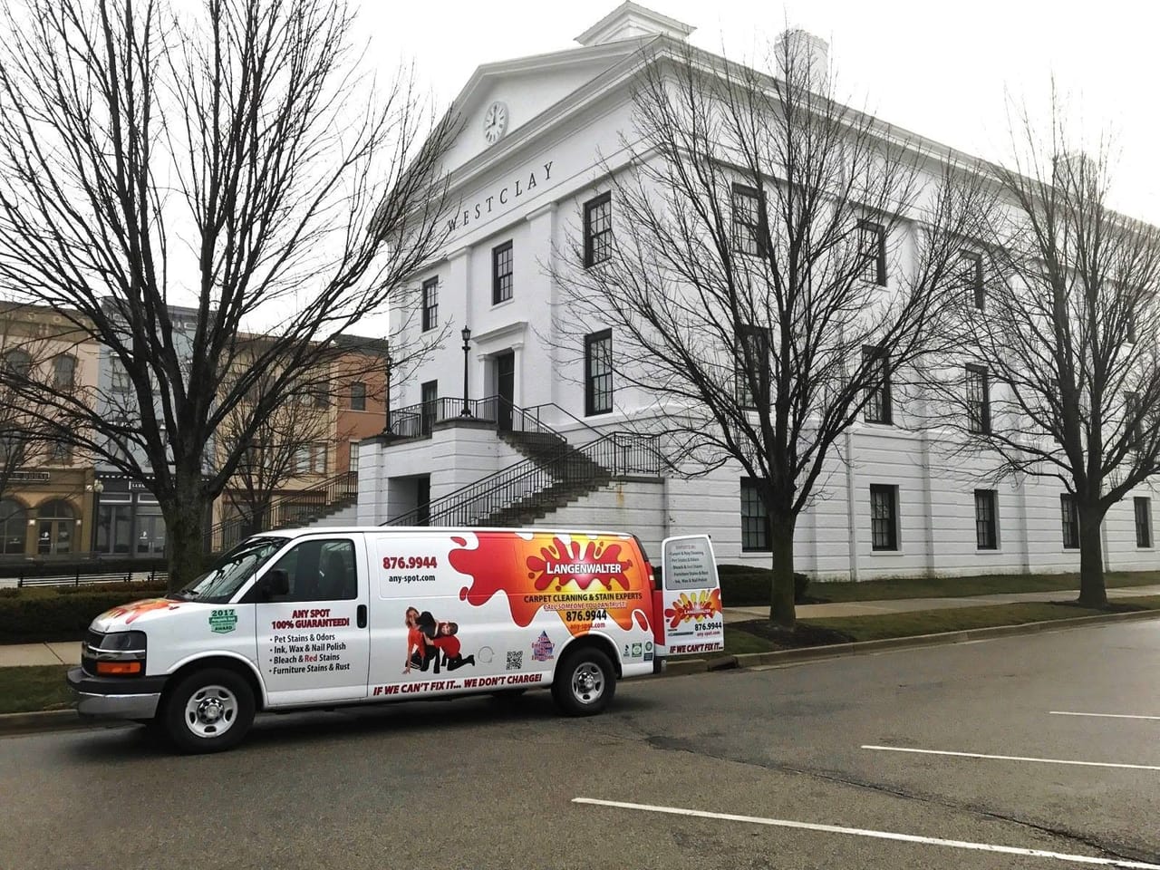 Langenwalter van parked outside a white meeting house